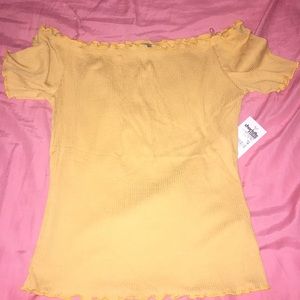 Cropped rubbed off the shoulder shirt